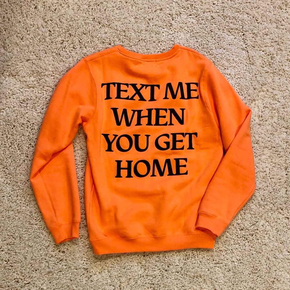 Bright orange lonely ghost crewneck